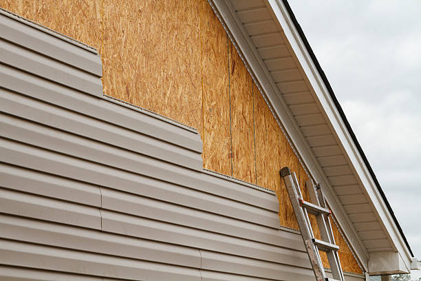 Professional Siding Contractor technician working in Baldwin, MD